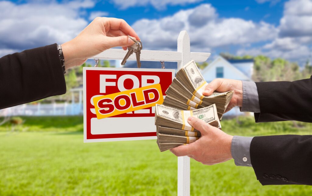 Long Island homeowner shaking hands after selling their house fast for cash